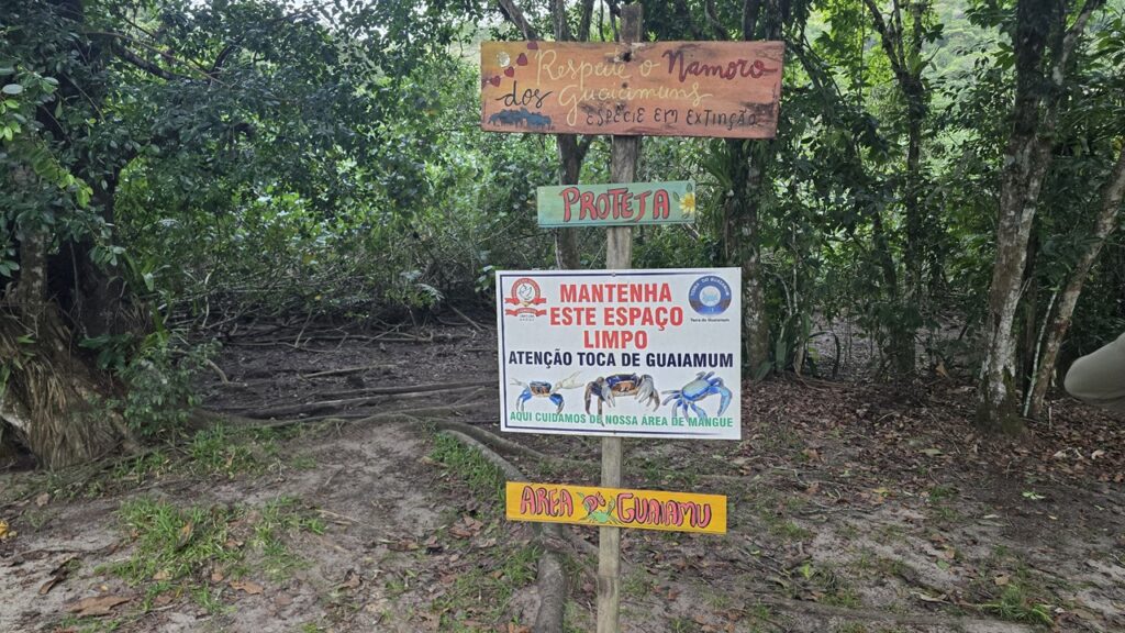 Placa pedindo proteção para os Guaiamu